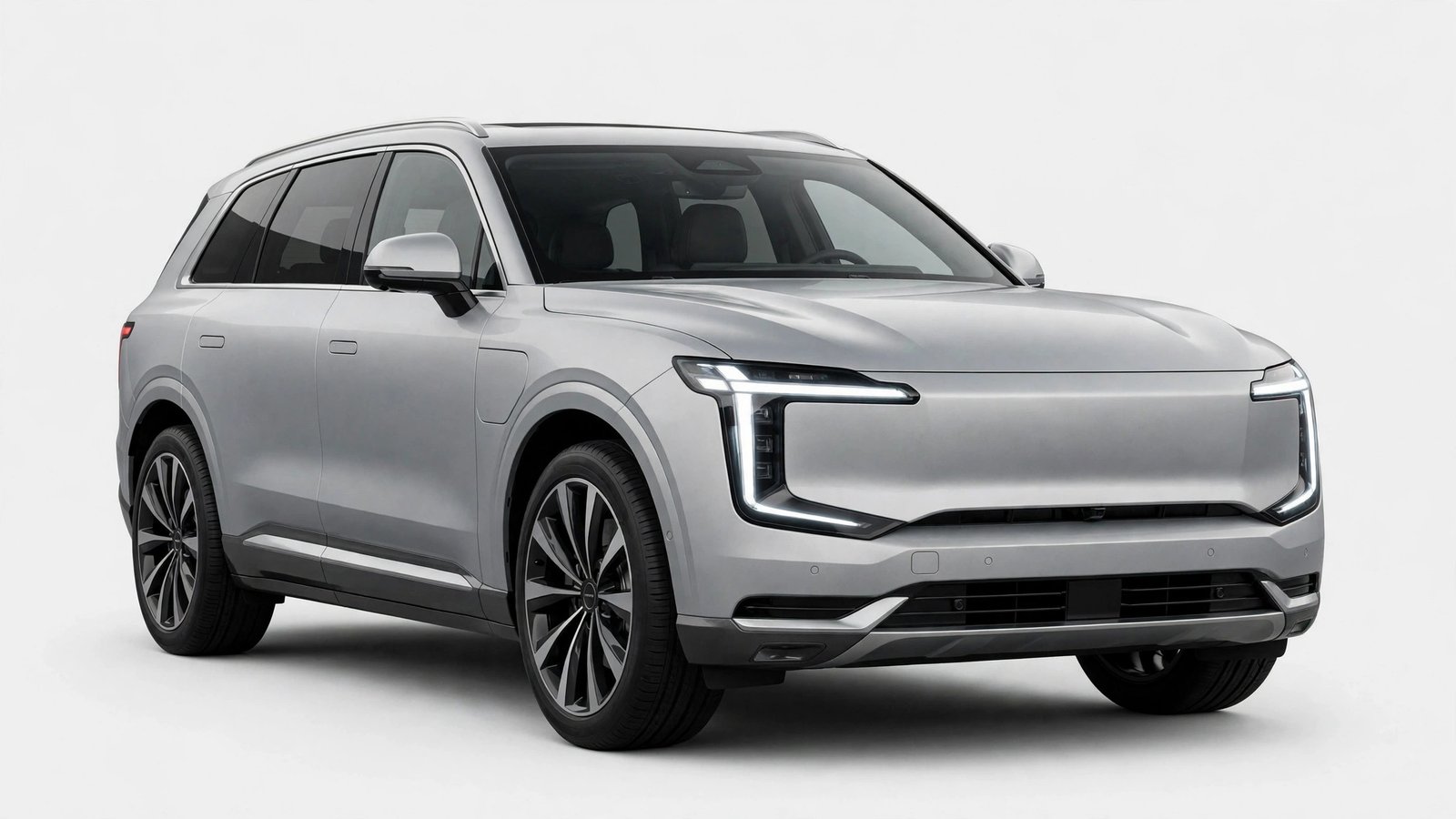 Volvo EX90 fully electric seven-seat SUV front view showing closed grille and Thor's Hammer headlights